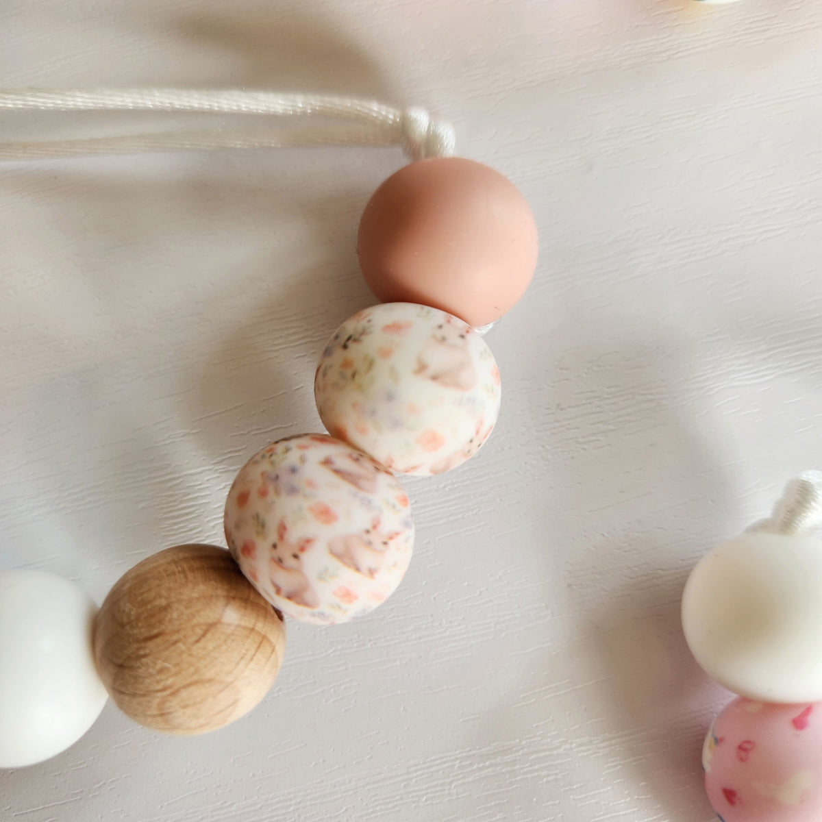 Attache-suce - Imprimé Lapin/Fleur / Licorne