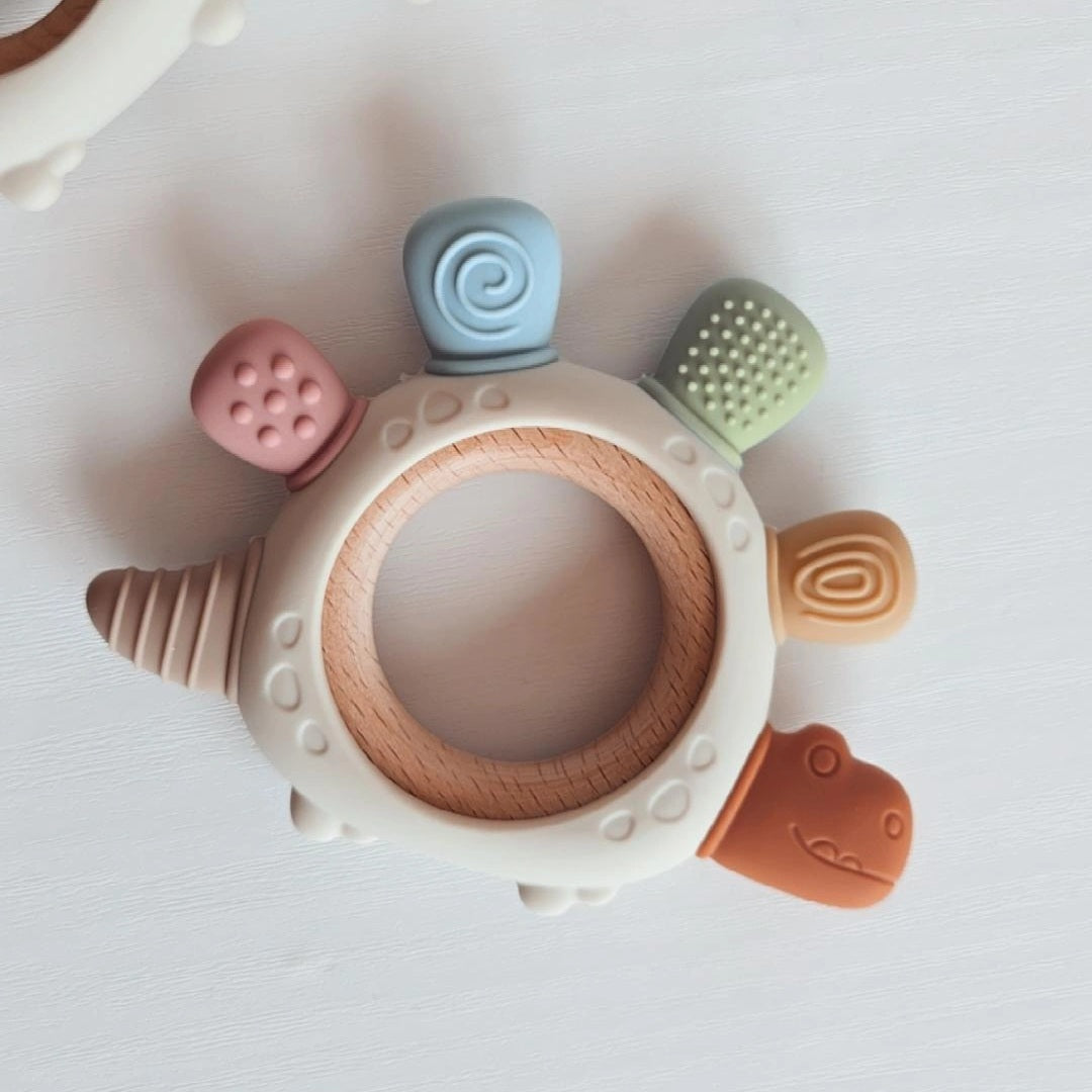 NOUVEAU - Jouet de dentition - Dino texturé multicolor